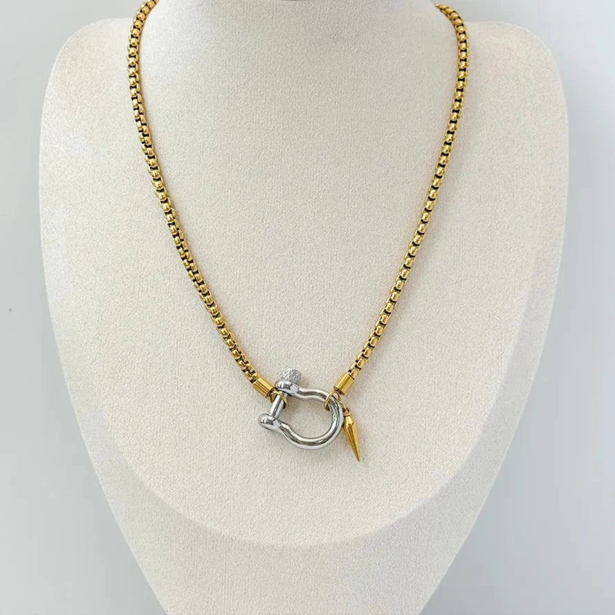 Horseshoe gold chain with silver charm